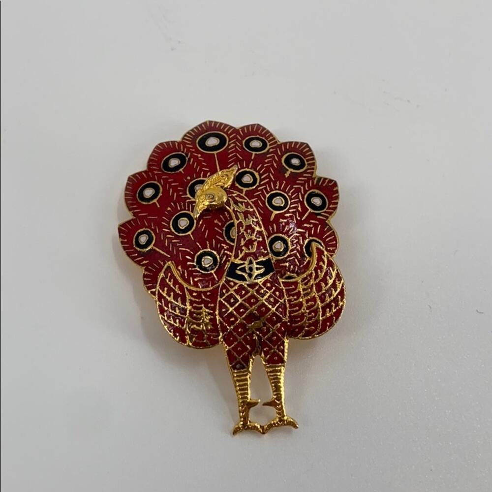 Vintage gold and red peacock brooch
